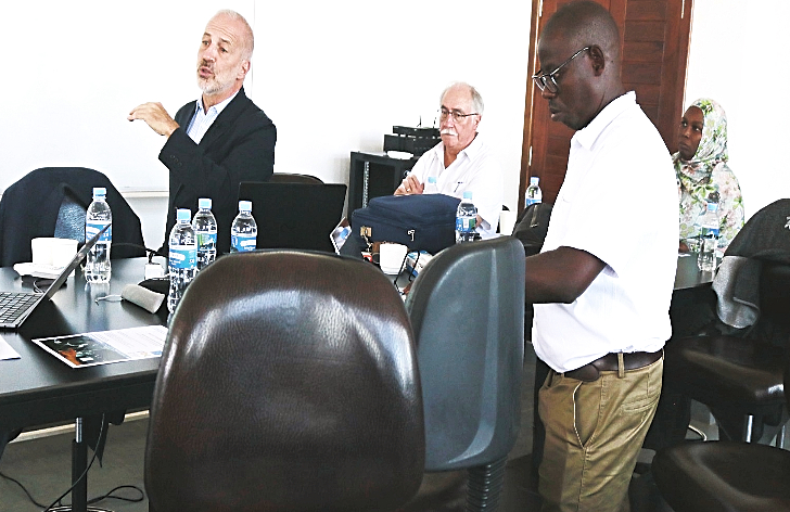 International faculty delivering a lecture